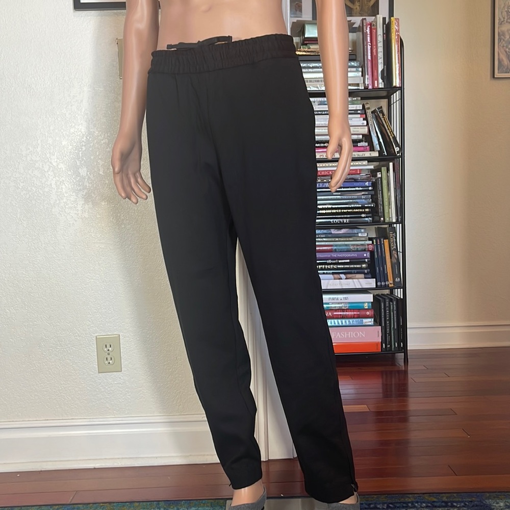 NEW COS drawstring trousers, sleek and comfort focused.